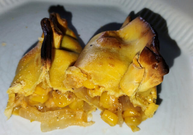 Sweet corn with creamy cheese, onions & a hint of garlic.